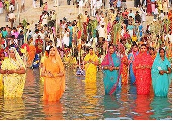 Worship Sun, during Chhath Puja or Chhat Puja in 2014 .